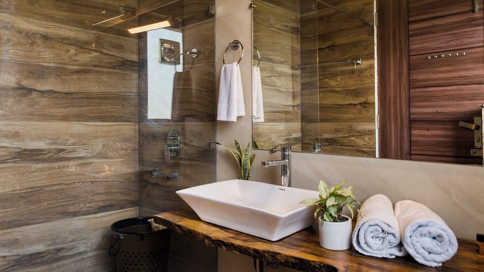 Shower, slippers, towels, soap
