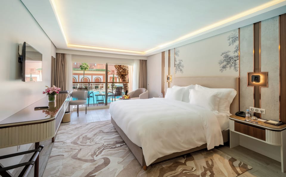 Premium Double Room, 1 King Bed, Pool View | Premium bedding, minibar, in-room safe, blackout drapes