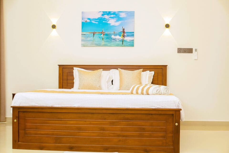 Deluxe Double Room, 1 King Bed, Balcony, Courtyard View | Desk, laptop workspace, soundproofing, iron/ironing board