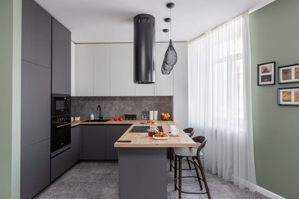 Luxury Apartment, Balcony, City View | Private kitchen | Electric kettle, cleaning supplies