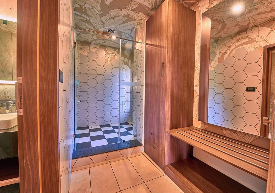 Signature Suite, 1 Bedroom, Balcony, Hill View | Bathroom | Shower, free toiletries, hair dryer, bidet