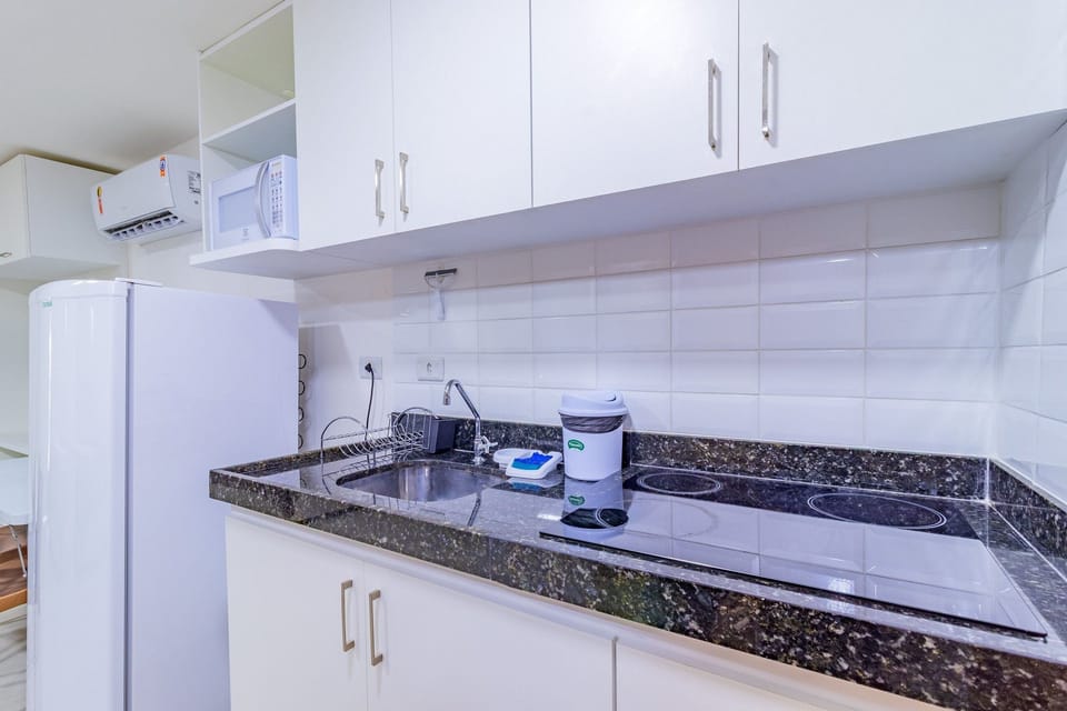 Basic Apartment | Private kitchen | Cookware/dishes/utensils, dining table