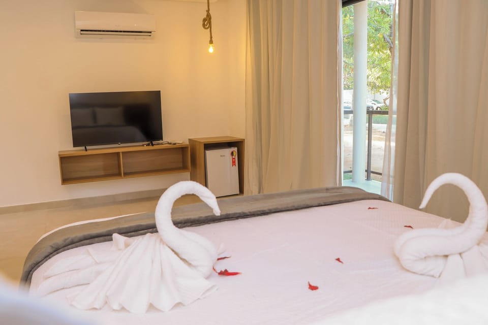 Deluxe Double Room, 1 Bedroom, Lanai, Garden View | Blackout drapes, iron/ironing board, free WiFi