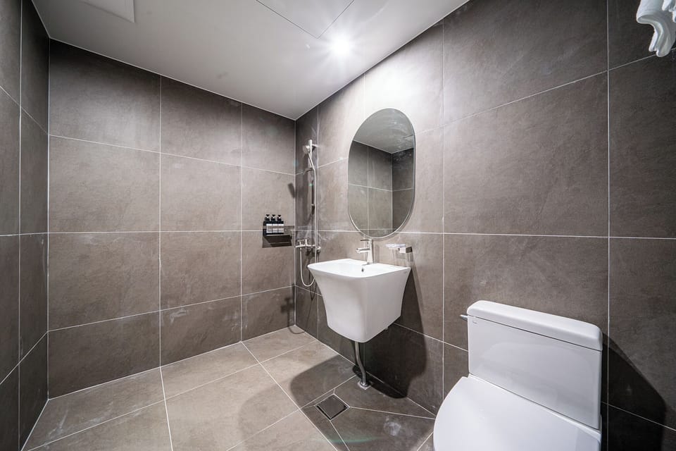 Brown Superior | Bathroom | Separate tub and shower, hair dryer, bathrobes, slippers