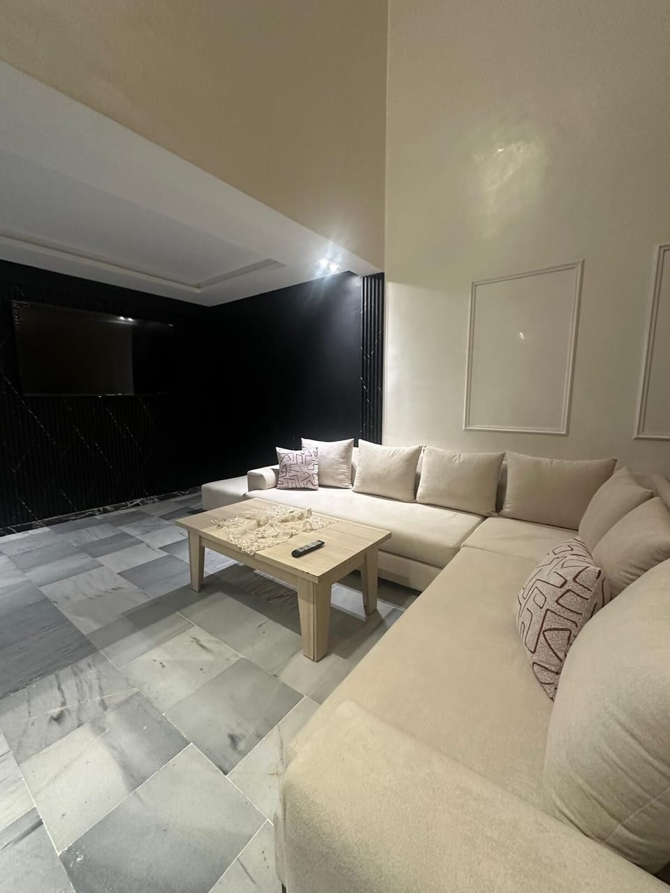 Deluxe Duplex | Living area | Flat-screen TV
