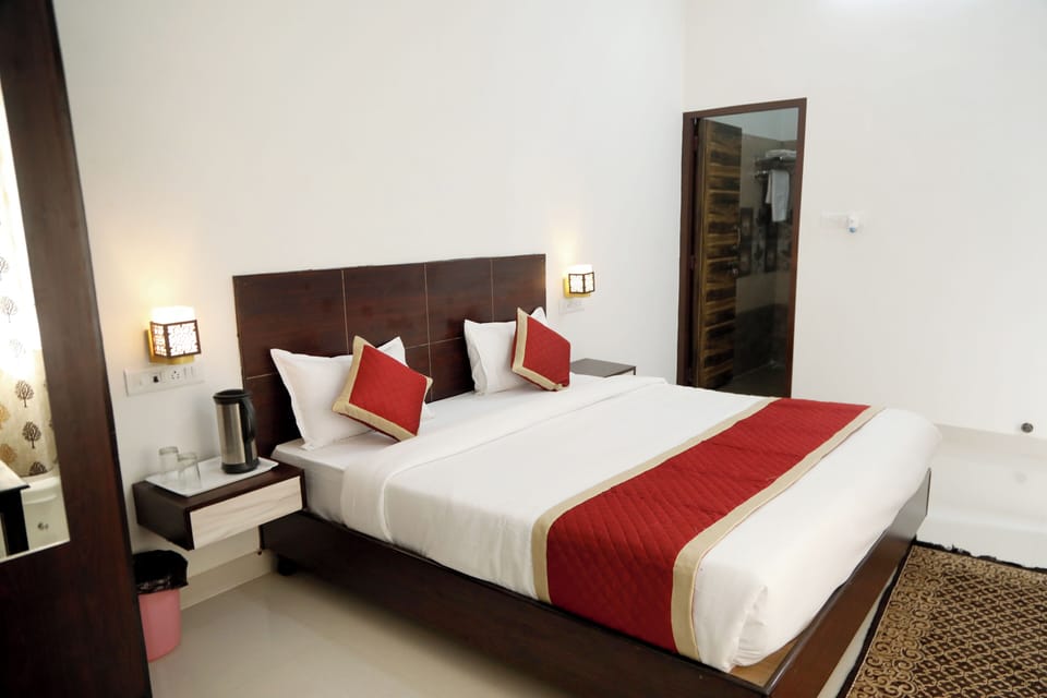 Deluxe Double Room, Garden View | Desk, laptop workspace, WiFi (free)