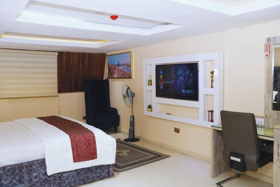 Deluxe Room, Balcony, City View | Desk, laptop workspace, blackout drapes, soundproofing