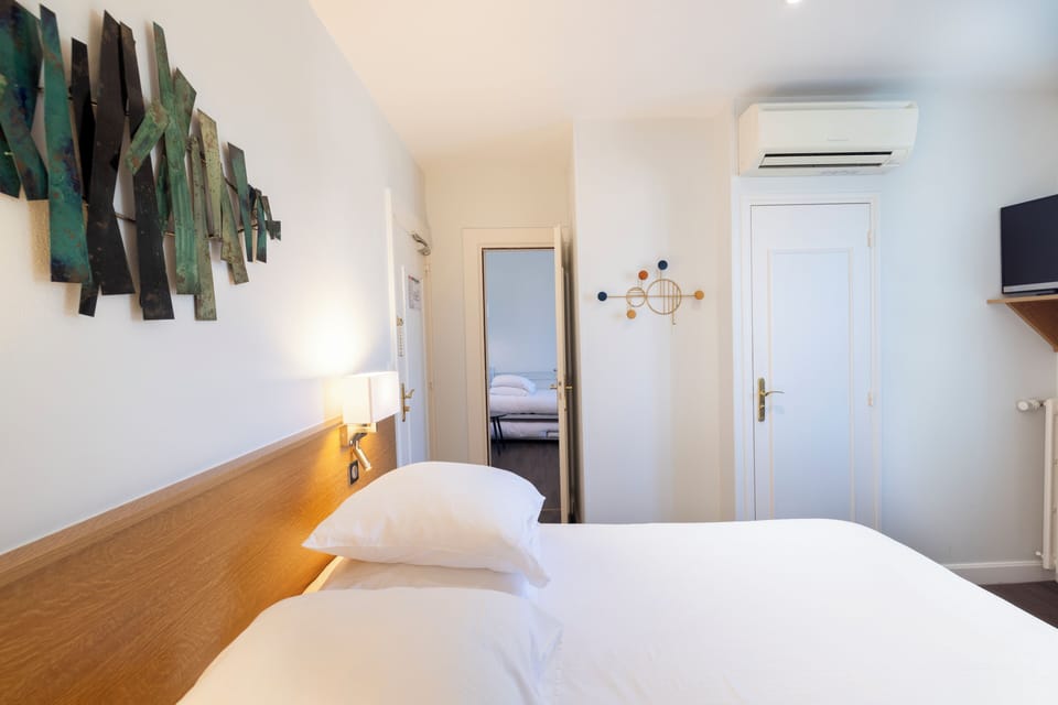 Standard Triple Room, City View | In-room safe, soundproofing, iron/ironing board, free WiFi