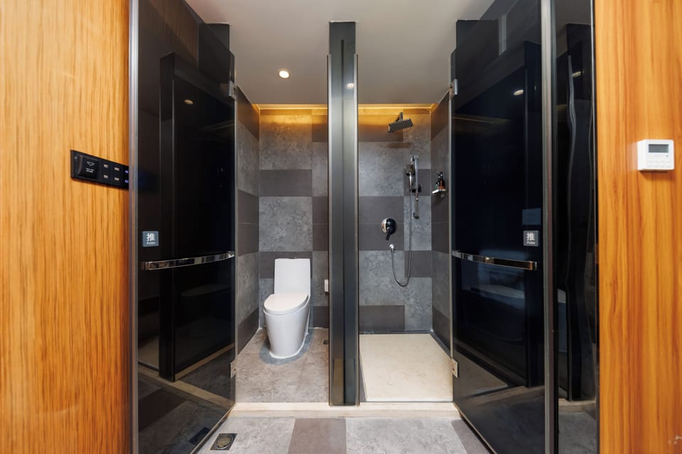 Business Twin Room, City View | Bathroom | Hair dryer, slippers, towels, soap