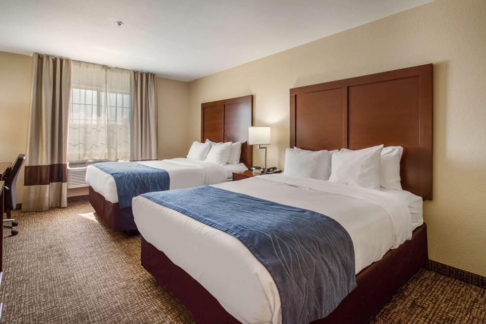 Premium bedding, desk, blackout drapes, iron/ironing board
