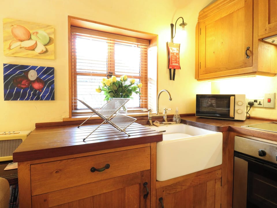 Fridge, microwave, toaster, cookware/dishes/utensils