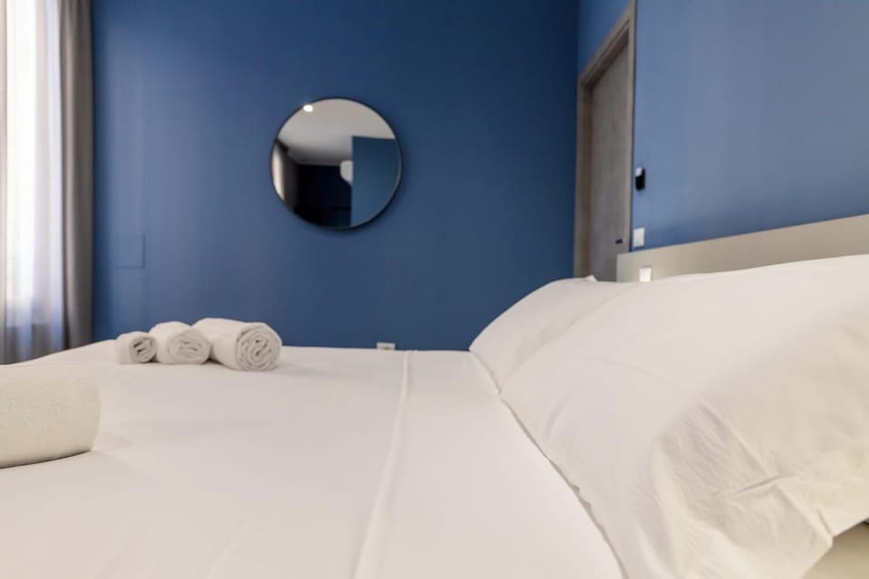 Deluxe Double Room | In-room safe, desk, laptop workspace, blackout drapes