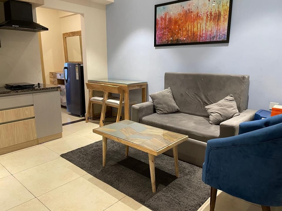 Standard Apartment, Balcony, Garden View | Desk, laptop workspace, blackout drapes, soundproofing