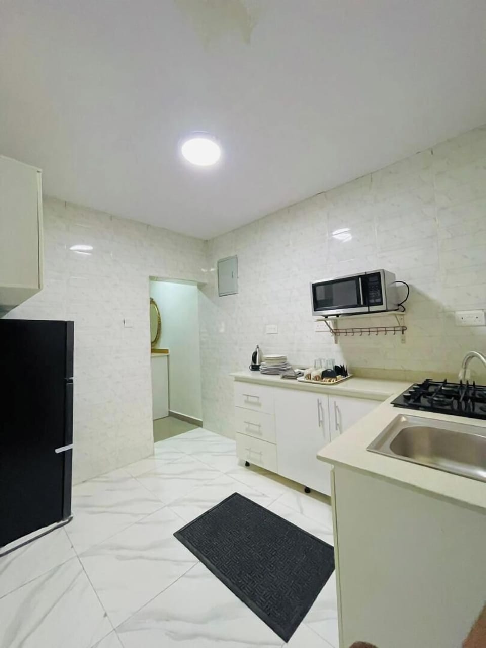 Family Room, Balcony, City View | Private kitchen | Fridge, microwave, oven, stovetop