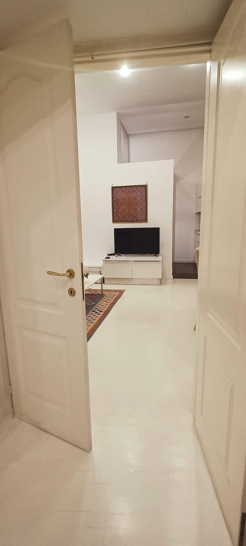 Deluxe Suite, Balcony, City View | Living area | TV