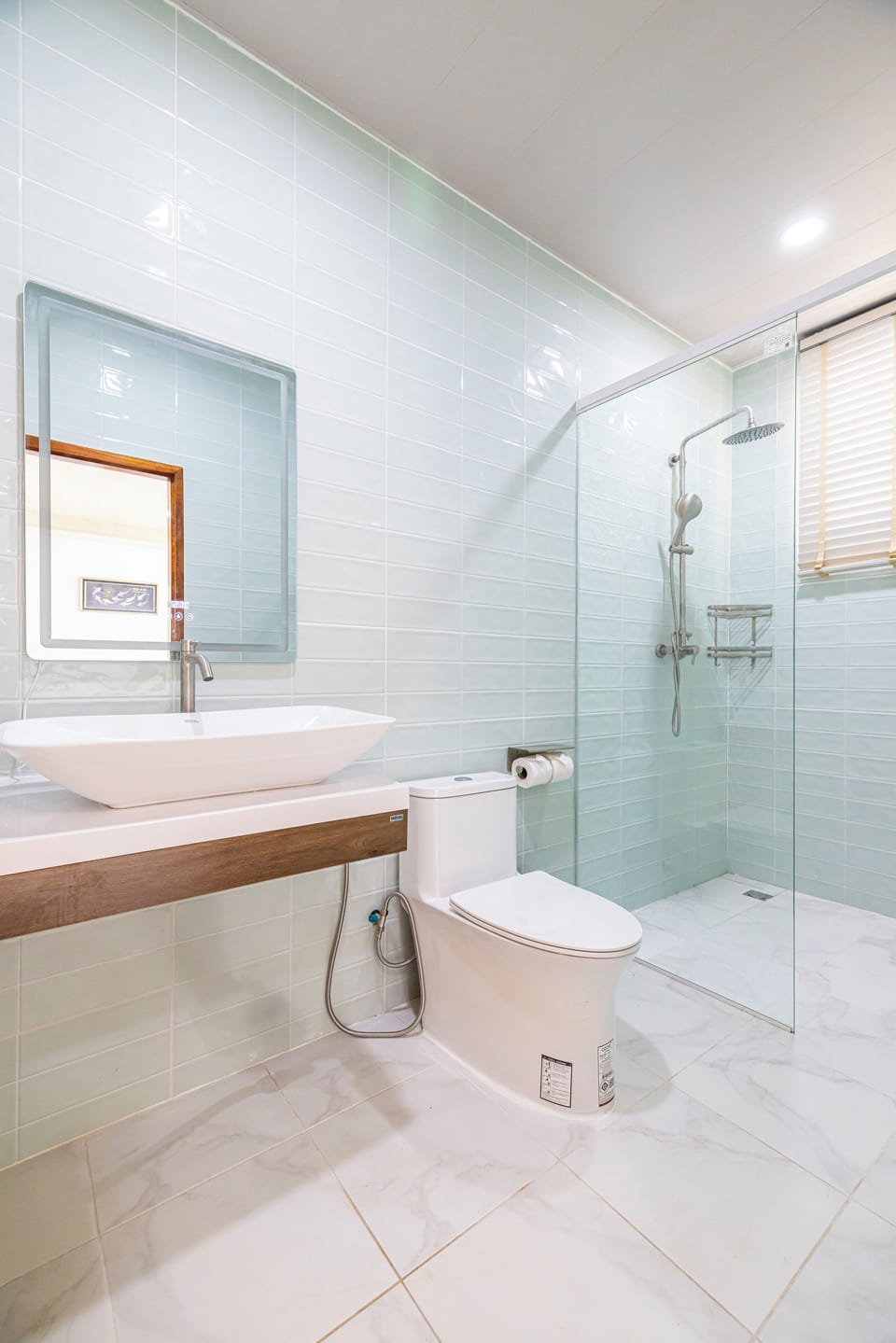 Family Triple Room, Balcony, Resort View | Bathroom | Shower, free toiletries, hair dryer, slippers
