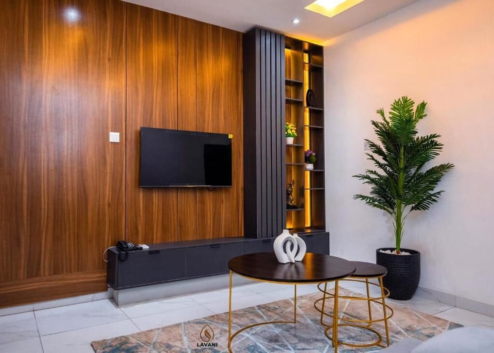 Luxury Apartment, Balcony, City View | Living area | Flat-screen TV, fireplace