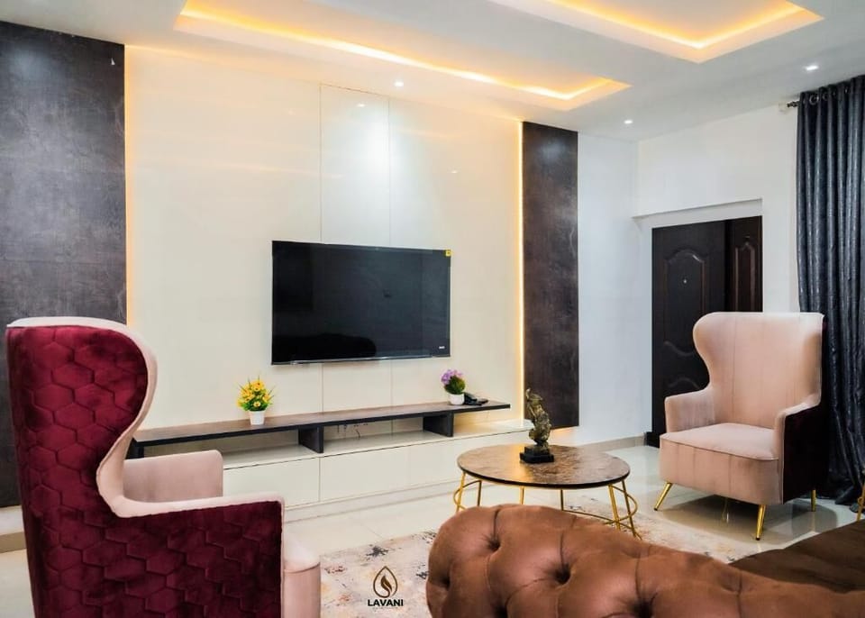 Luxury Apartment, Balcony, City View | Living area | Flat-screen TV, fireplace