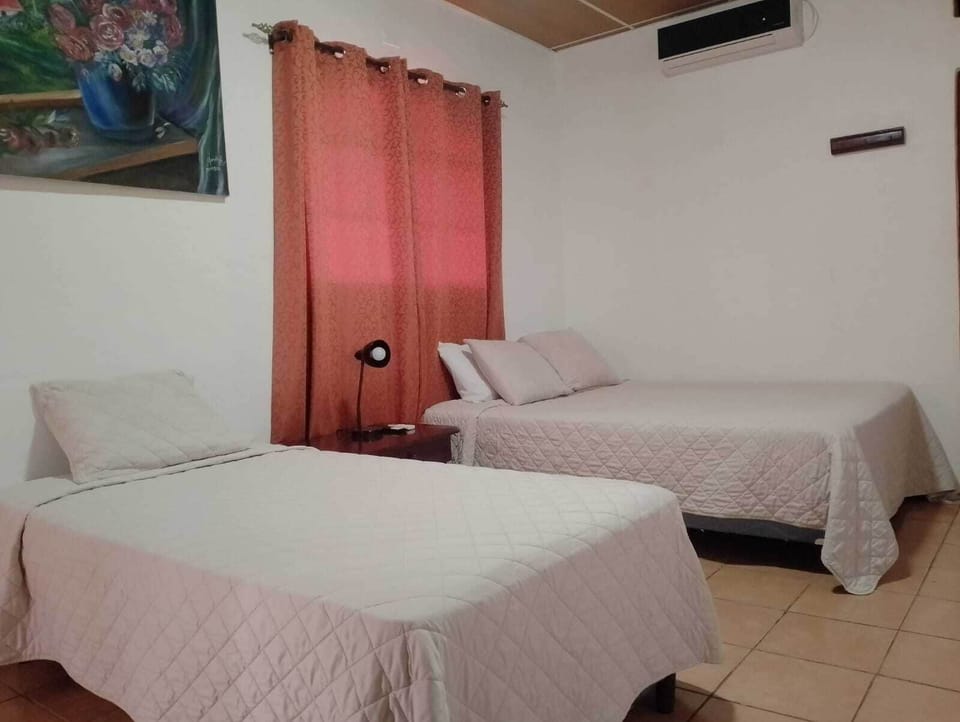 Deluxe Triple Room | Down comforters, desk, blackout drapes, soundproofing