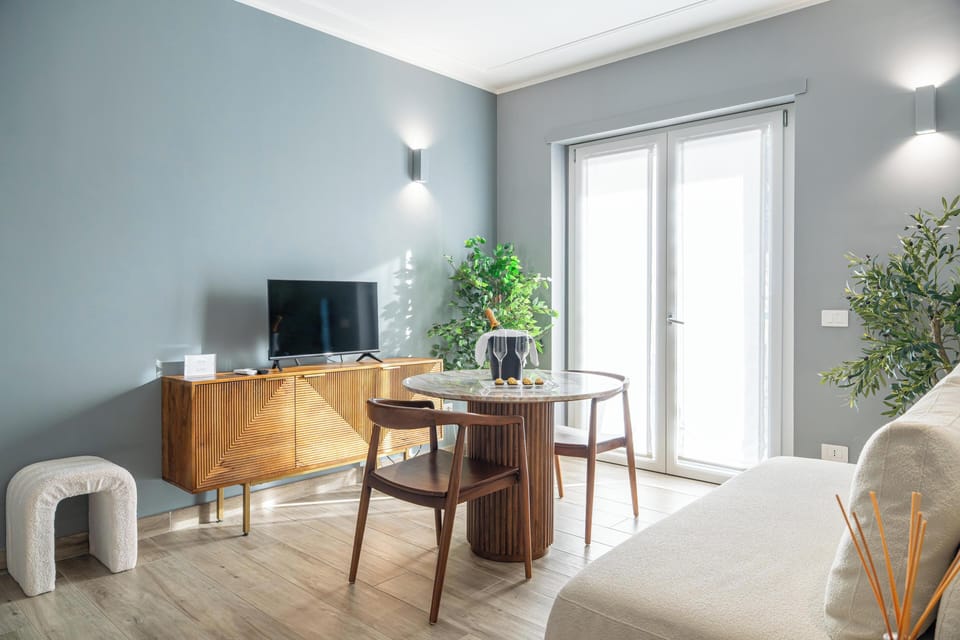 Deluxe Apartment, Balcony, Garden View | Living area | 40-inch Smart TV with cable channels, heated floors