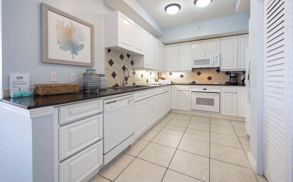 Condo, Multiple Beds (Beach Colony East 3B) | Private kitchen | Oven, toaster, paper towels