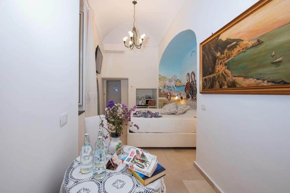 Family Studio Suite, 1 Bedroom, Balcony, City View | Frette Italian sheets, premium bedding, down comforters, pillowtop beds