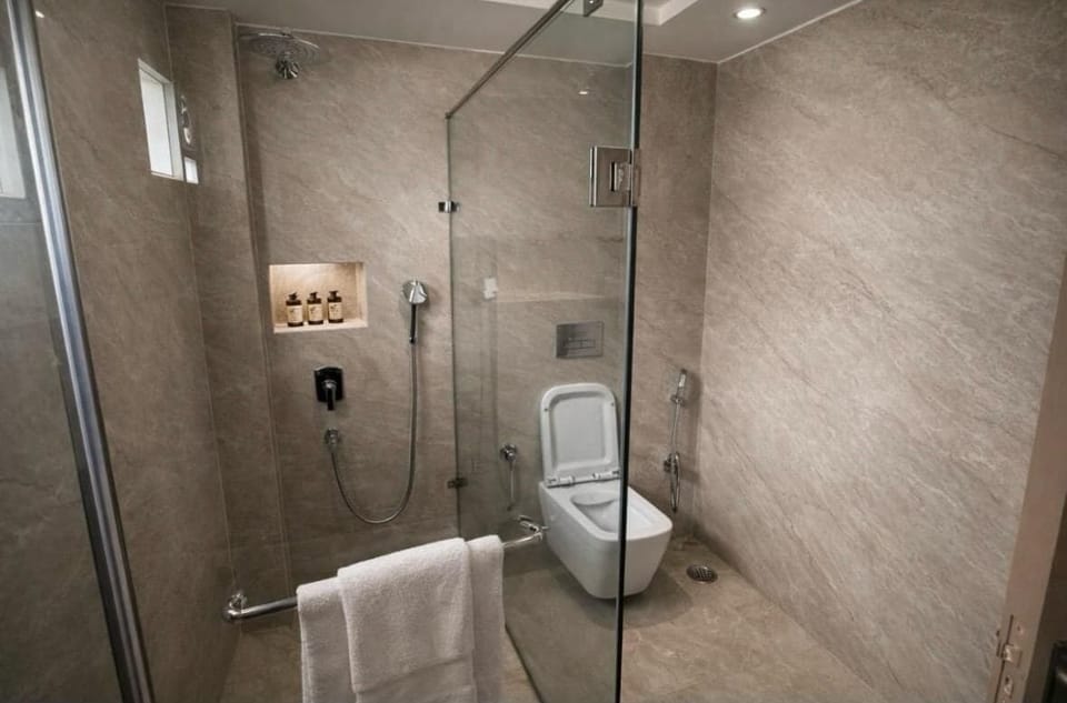 Shower, free toiletries, hair dryer, slippers