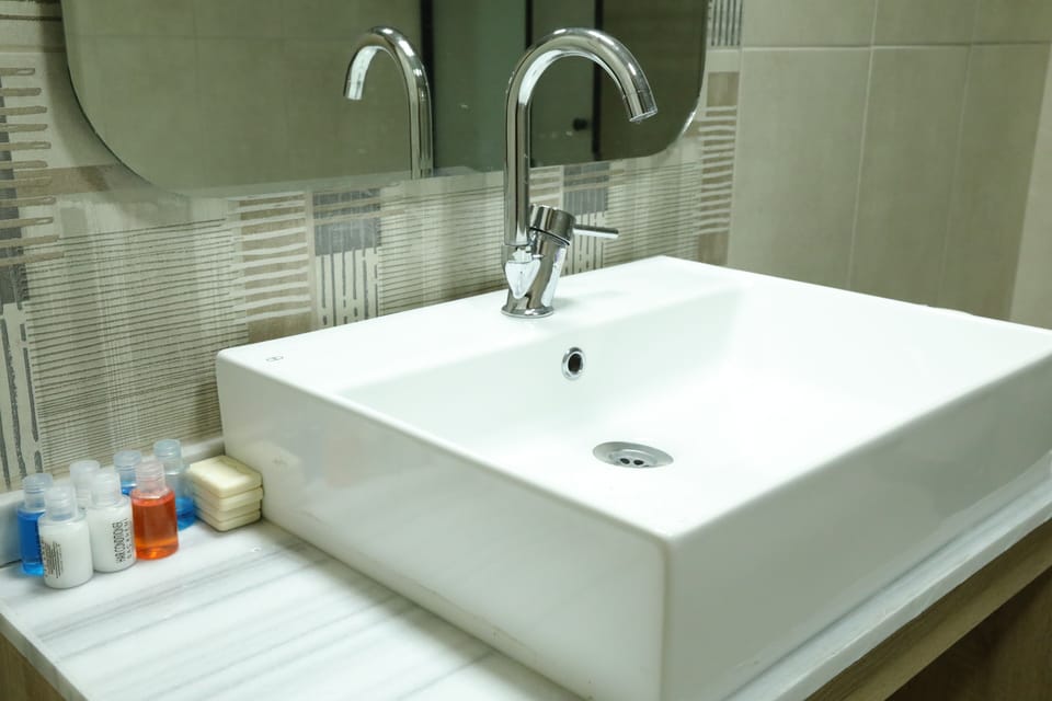 Family Studio Suite, Mountain View | Bathroom | Shower, hair dryer, slippers, towels