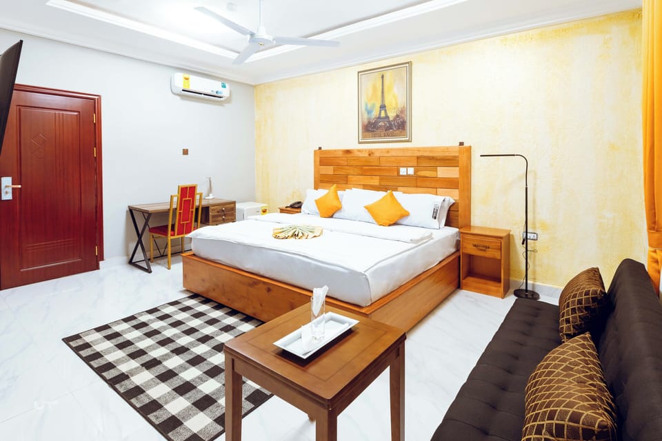 Deluxe Double Room, Courtyard View | Desk, laptop workspace, iron/ironing board (on request), WiFi (free)