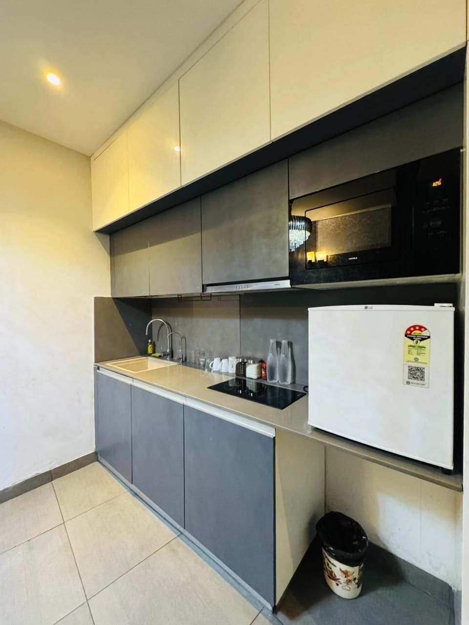 Mini-fridge, microwave, cookware/dishes/utensils