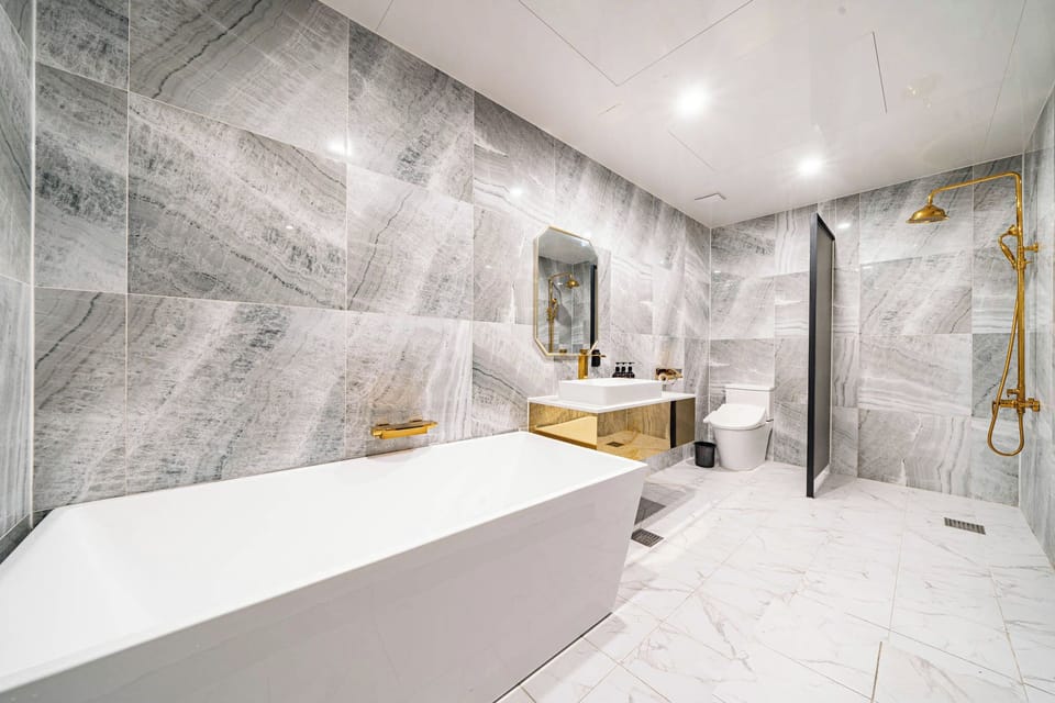 Premium Massage Chair | Bathroom | Free toiletries, hair dryer, bathrobes, bidet