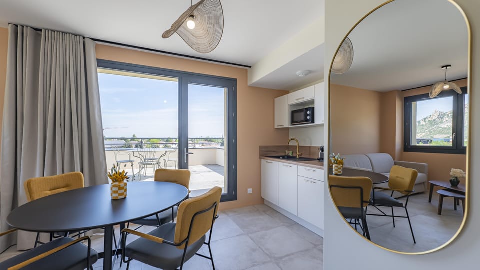 Apartment, Multiple Beds | Private kitchenette | Dining tables