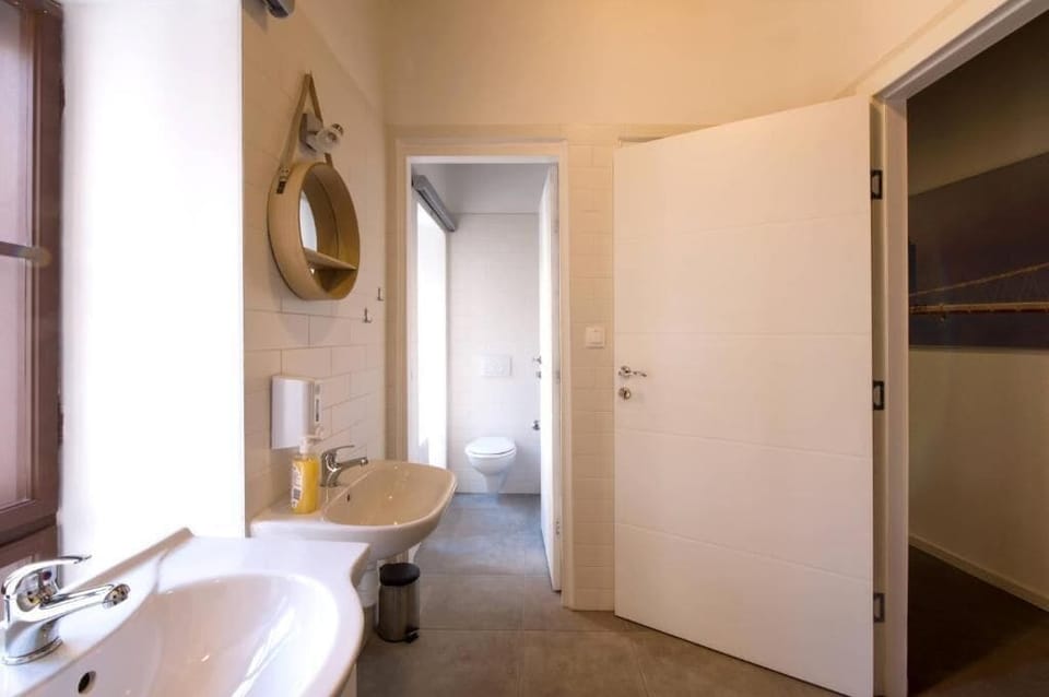 Basic Room, Multiple Beds | Bathroom | Shower, hair dryer, towels, soap