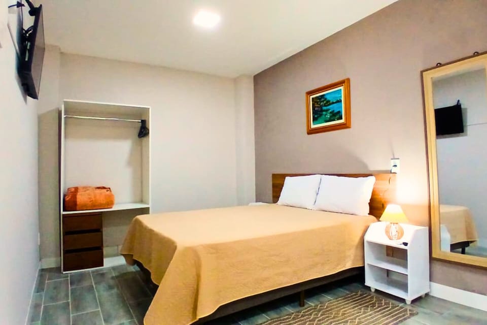 Double Room, Courtyard View | Pillowtop beds, iron/ironing board, free WiFi, bed sheets