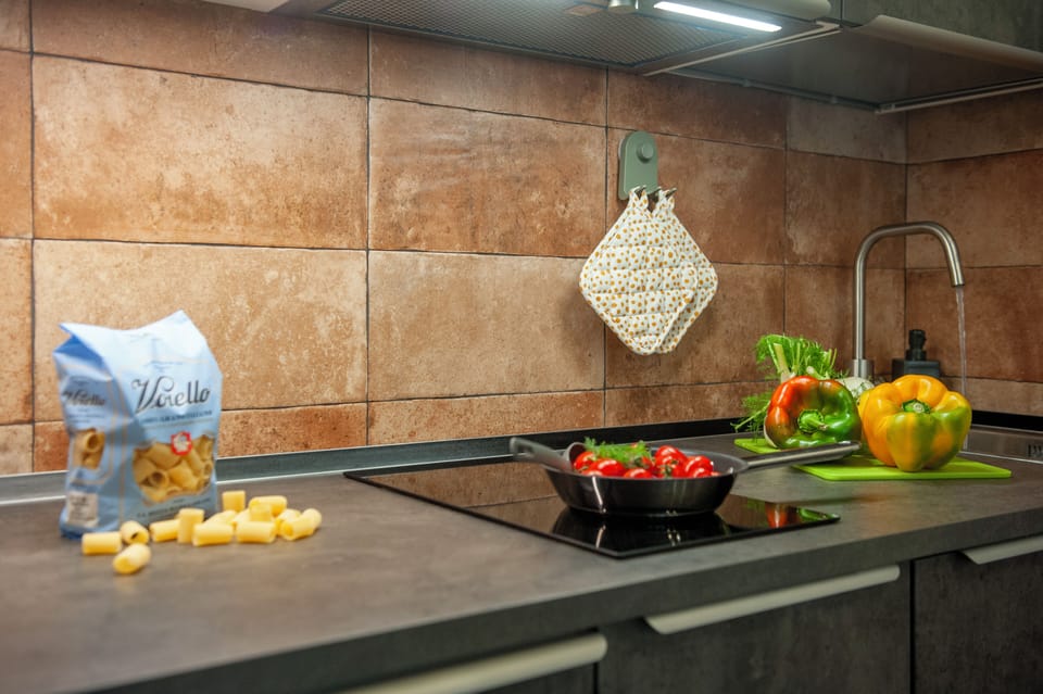 Apartment (1 Bedroom) | Private kitchen | Espresso maker, microwave, stovetop, dishwasher
