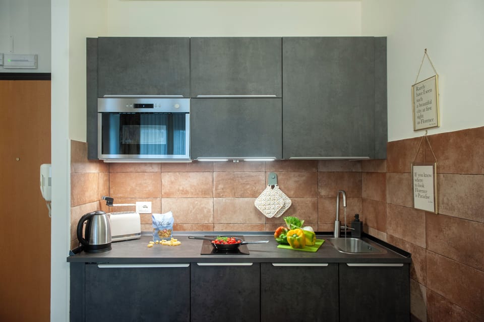 Apartment (1 Bedroom) | Private kitchen | Microwave, stovetop, dishwasher, espresso maker