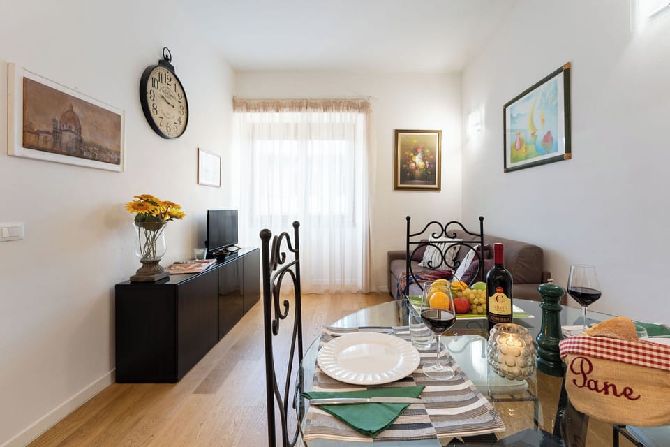 Apartment (1 Bedroom) | Living area | 32-inch Smart TV with cable channels