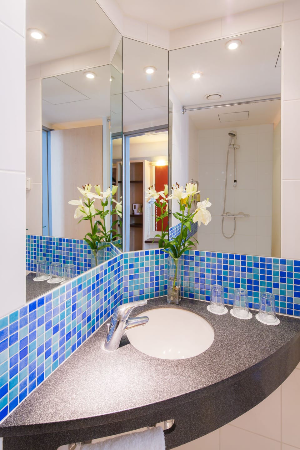 Shower, eco-friendly toiletries, hair dryer, towels