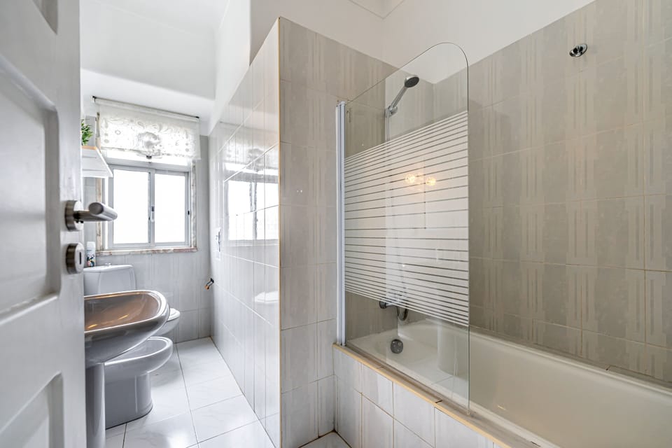 Shower, towels, soap, toilet paper