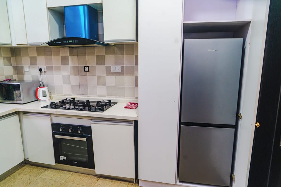 Apartment, Non Smoking, Air conditioning | Private kitchen | Full-size fridge, oven, cookware/dishes/utensils