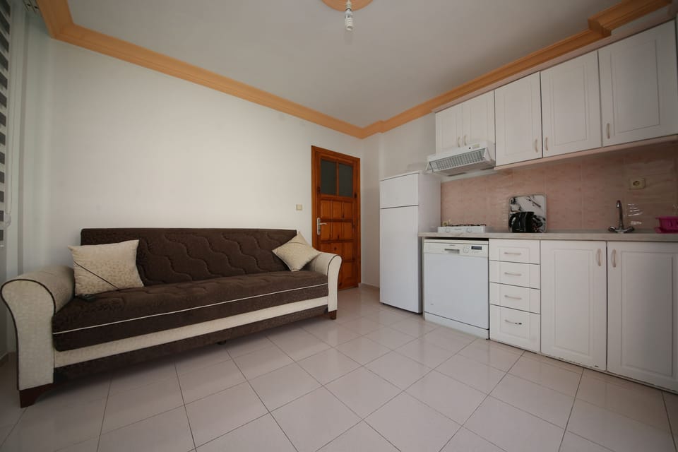 Standard Apartment, Balcony, Pool View | Living area