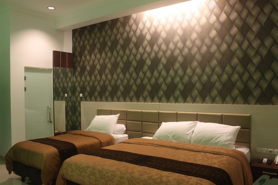 Family Triple Room, Non Smoking | Premium bedding, in-room safe, desk, rollaway beds