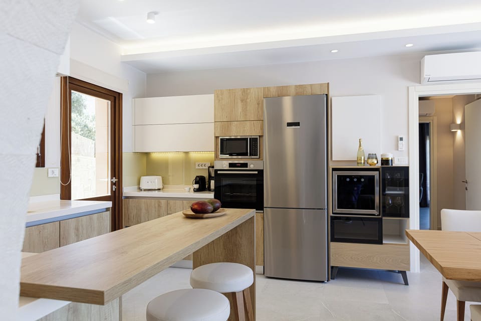 Premier Villa, 5 Bedrooms, Partial Sea View | Private kitchen | Espresso maker, coffee/tea maker, electric kettle, highchair