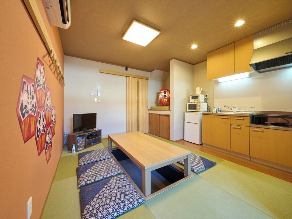 Basic Apartment | Living area | 32-inch flat-screen TV with digital channels