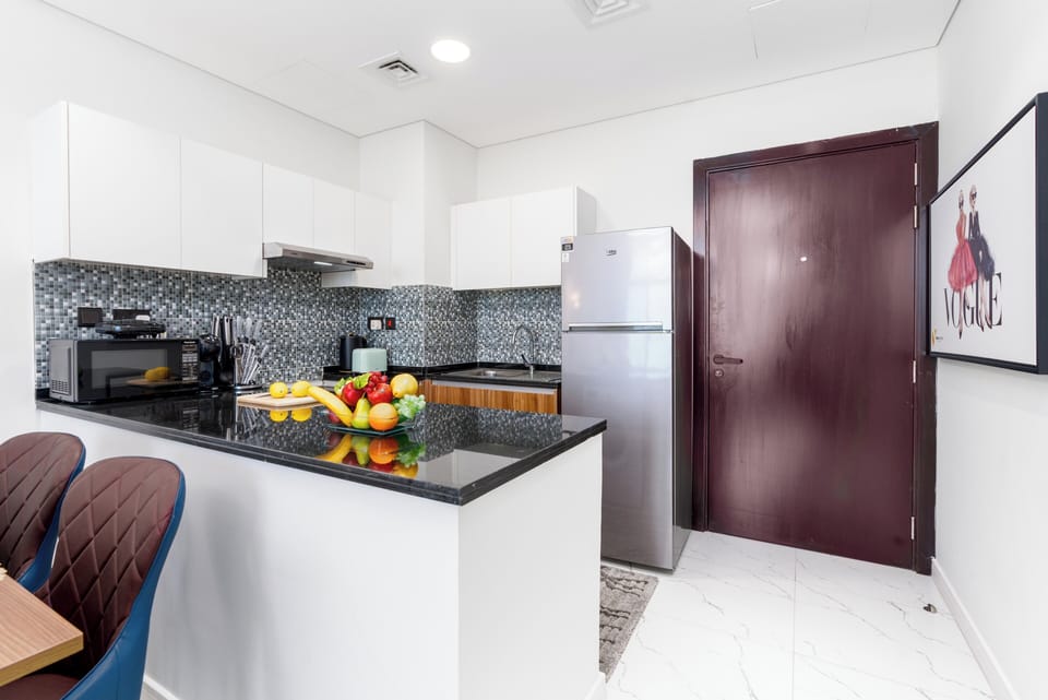 Luxury Apartment, Balcony, City View | Private kitchen | Full-size fridge, microwave, oven, stovetop