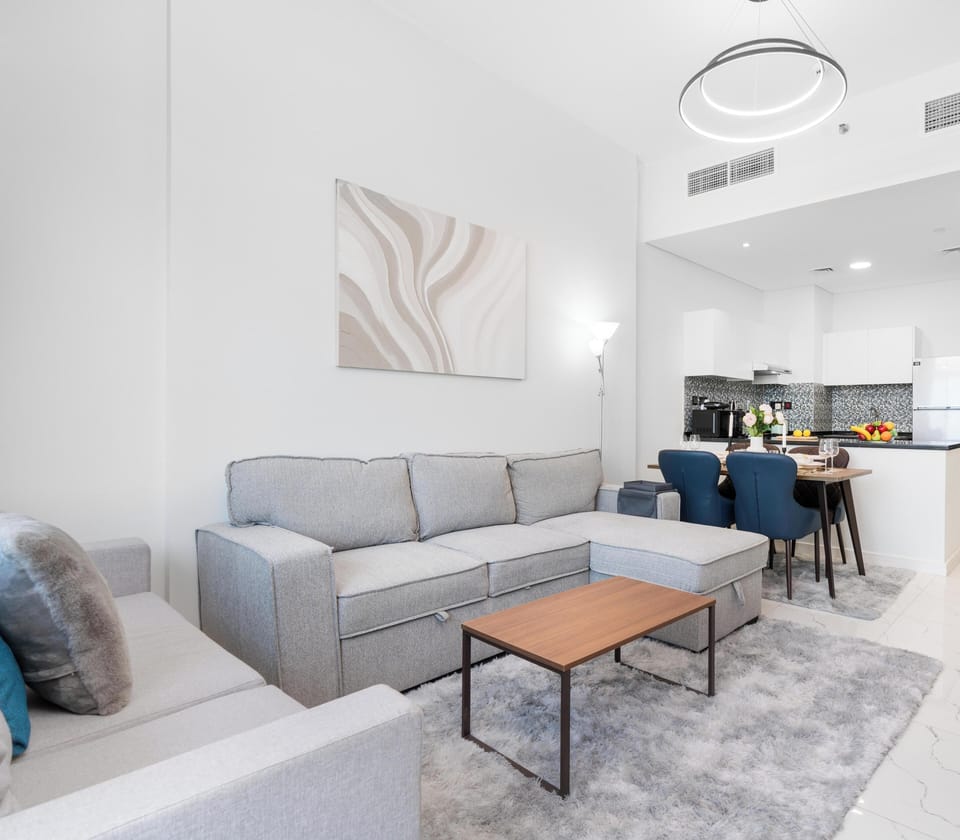 Luxury Apartment, Balcony, City View | Living area | 65-inch Smart TV with cable channels