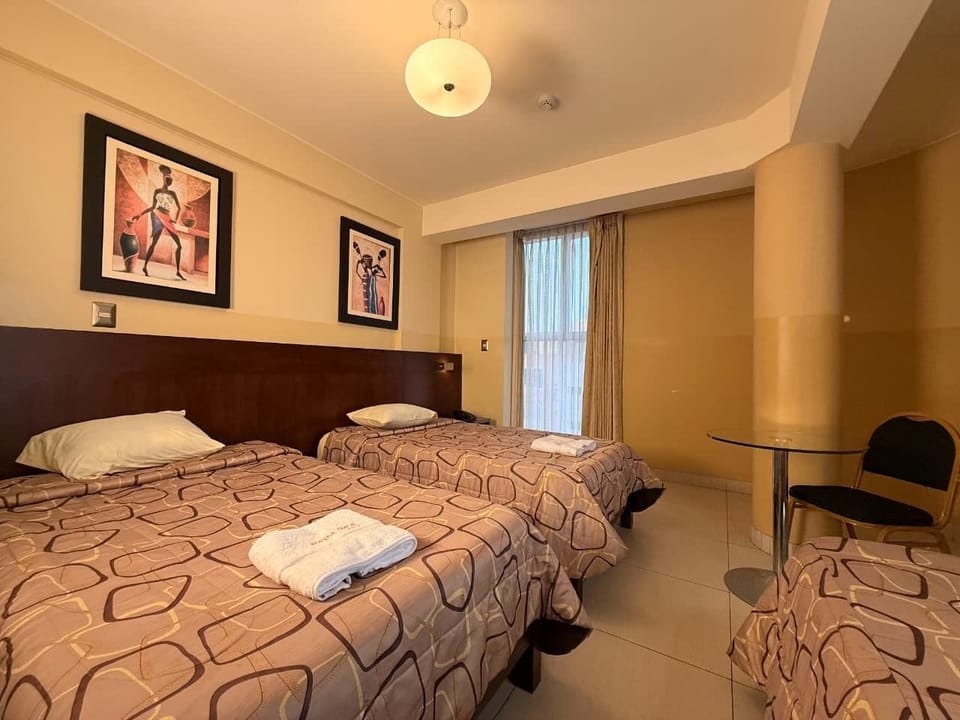 Family Triple Room, Multiple Beds, Private Bathroom, City View | Laptop workspace, free WiFi
