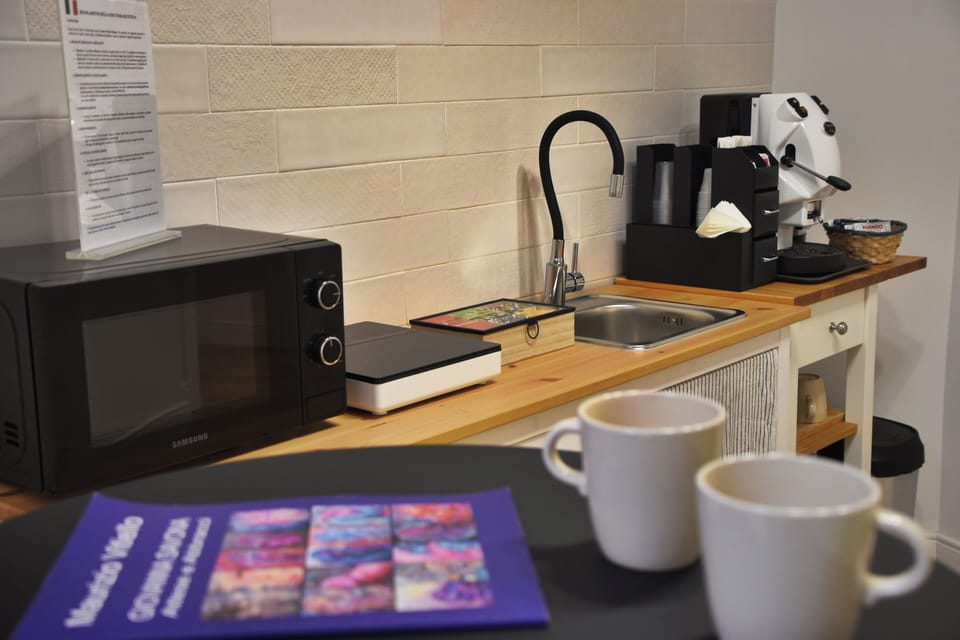 Mini-fridge, microwave, stovetop, espresso maker