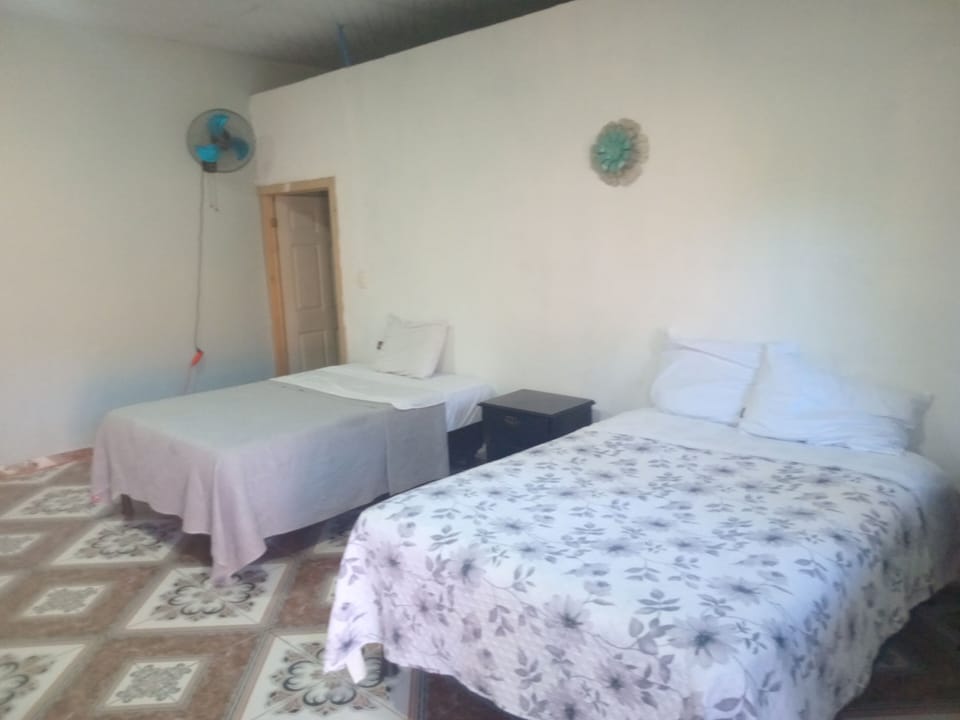 Basic Triple Room, Garden View | Iron/ironing board (on request), WiFi (free)