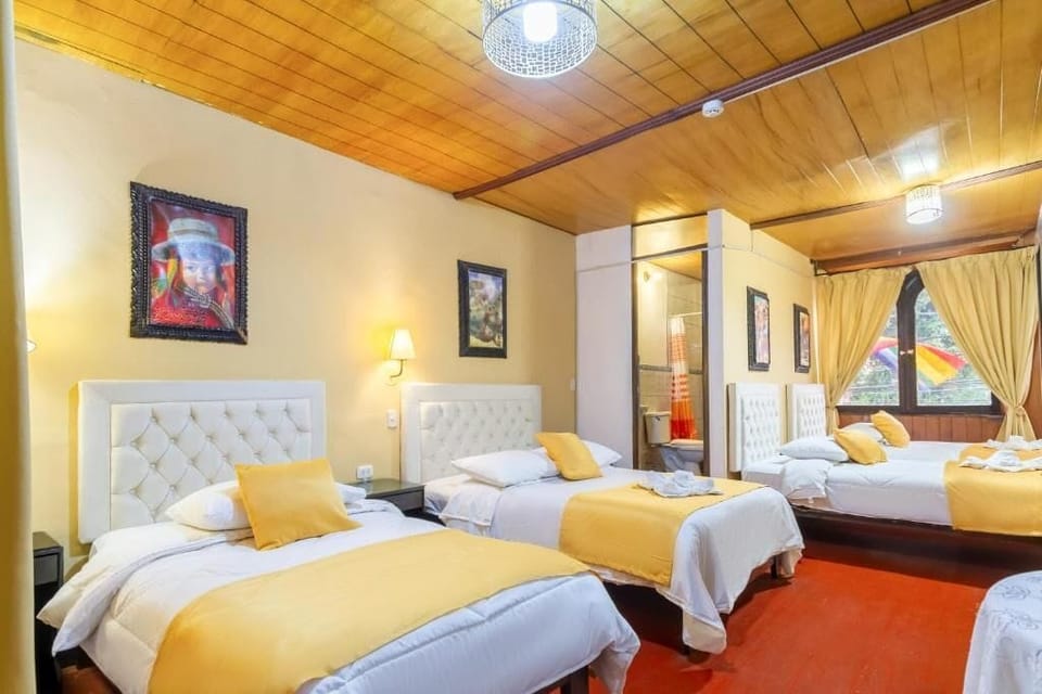Family Triple Room, City View | Desk, laptop workspace, free WiFi